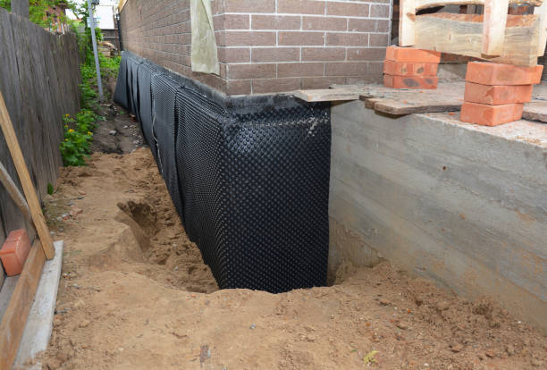 Happy homeowners after waterproofing job in Springfield